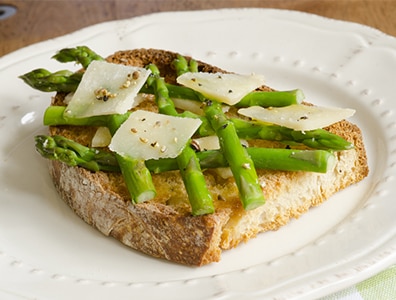 Fresh Asparagus And Cheese Sauce On Toast
